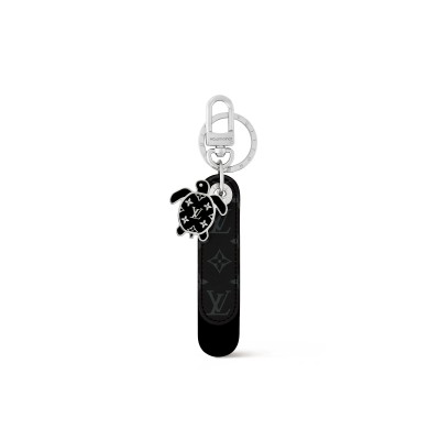 LOUIS VUITTON DRAGONNE TAB KEY HOLDER AND BAG CHARM M02569